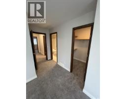 Living room - 505 1303 Paton Crescent, Saskatoon, SK S7W0P7 Photo 2