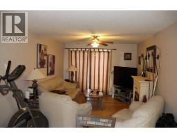 Living room - 305 5037 7 Avenue, Edson, AB T7E0A8 Photo 5