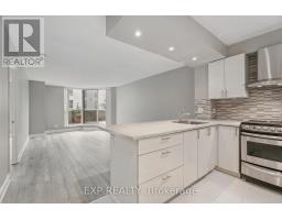 Living room - 301 140 Dunlop Street E, Barrie, ON L4M6H9 Photo 2