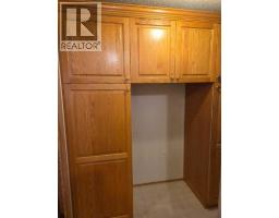 Living room - 49 900 Ross Street, Crossfield, AB T0M0S0 Photo 3