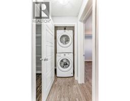 Dining room - 1213 2461 Baysprings Link Sw, Airdrie, AB T4B4C6 Photo 2