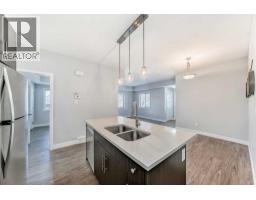 Kitchen - 1213 2461 Baysprings Link Sw, Airdrie, AB T4B4C6 Photo 3