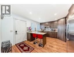 Living room - 1 1406 2nd Avenue, Canmore, AB T1W1M9 Photo 3