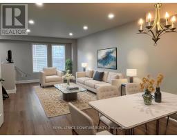 Living room - 51 6880 Meadowvale Town Centre Circle, Mississauga, ON L5N7T4 Photo 2