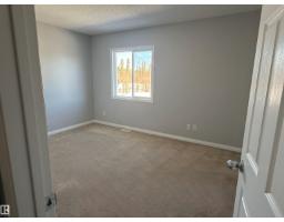 Primary Bedroom - 10 624 41 St, Edson, AB T7E1A2 Photo 4