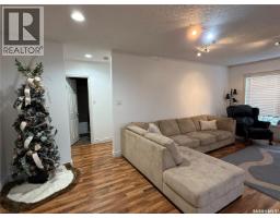 Living room - 107 5th Avenue E, Kindersley, SK S0L1S0 Photo 3