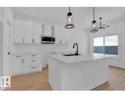 Dining room - 219 Ravine Dr, Devon, AB T9G0M2 Photo 2