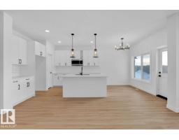 Den - 219 Ravine Dr, Devon, AB T9G0M2 Photo 4