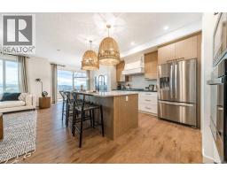 Dining room - 45 Monarch Bend, Rural Rocky View County, AB T3Z0K3 Photo 2