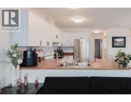 Primary Bedroom - B 9700 95 Avenue, Sexsmith, AB T0H3C0 Photo 5