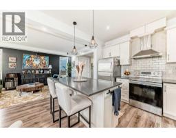 Living room - 763 Windridge Road Sw, Airdrie, AB T4B2R1 Photo 4