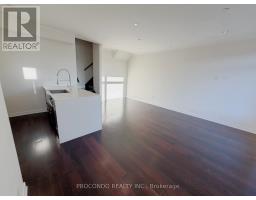 Kitchen - Th 10 4070 Parkside Village Drive, Mississauga, ON L5B3M8 Photo 3