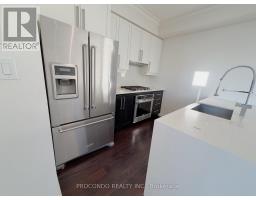 Bedroom 2 - Th 10 4070 Parkside Village Drive, Mississauga, ON L5B3M8 Photo 4