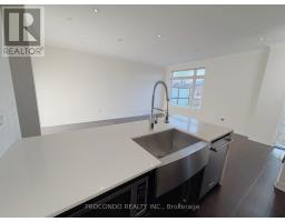 Bedroom 3 - Th 10 4070 Parkside Village Drive, Mississauga, ON L5B3M8 Photo 5