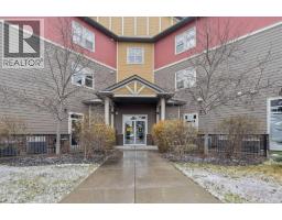 Living room - 9312 101 Sunset Drive, Cochrane, AB T4C0W7 Photo 5