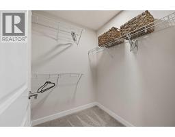 Primary Bedroom - 2210 Bayview Drive Sw, Airdrie, AB T4B5N4 Photo 4