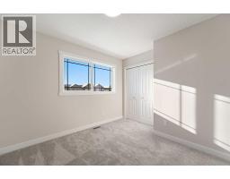 Dining room - 2210 Bayview Drive Sw, Airdrie, AB T4B5N4 Photo 3