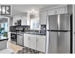 Primary Bedroom - 208 3223 83 Street Nw, Calgary, AB T3B5N4 Photo 5