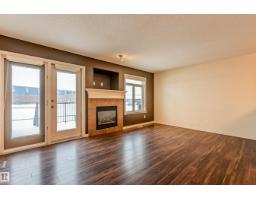 Bedroom 2 - 28 9511 102 Ave, Morinville, AB T8R0C6 Photo 5