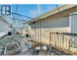 Kitchen - 56 134 Village Way, Strathmore, AB T1P0C2 Photo 5