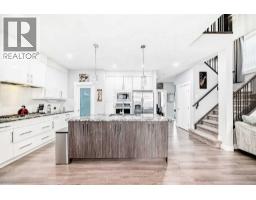 Living room - 1368 Lackner Boulevard, Carstairs, AB T0M0N0 Photo 5