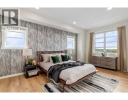 Living room - 122 Lanark Gate Se, Airdrie, AB T4A3P1 Photo 3