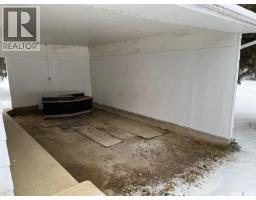 Living room - 403 Cedar Avenue, Buckland Rm No 491, SK S6V5R3 Photo 3