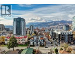 Primary Bedroom - 1308 Richter Street Unit 106, Kelowna, BC V1Y2L3 Photo 2