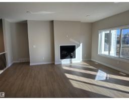 Family room - 145 Elm St, Fort Saskatchewan, AB T8L0X8 Photo 4