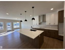 Kitchen - 145 Elm St, Fort Saskatchewan, AB T8L0X8 Photo 3
