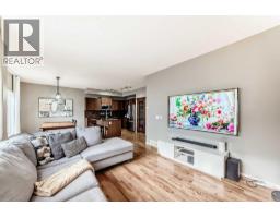 Living room - 284 Sagewood Landing Sw, Airdrie, AB T4B3N6 Photo 5