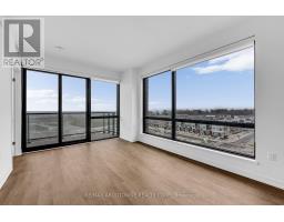 Bedroom 2 - 517 251 Masonry Way, Mississauga, ON L5H0B2 Photo 5