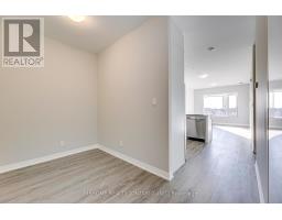 Family room - 312 3265 Carding Mill Trail W, Oakville, ON L6M5P7 Photo 5