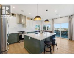 Dining room - 16 Key Cove Sw, Airdrie, AB T4B5T3 Photo 2