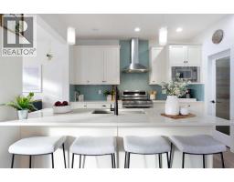 Dining room - 325 Bayview Way Sw, Airdrie, AB T4B4H3 Photo 3