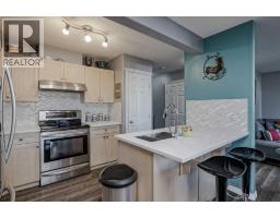 Primary Bedroom - 7 102 Canoe Square Sw, Airdrie, AB T4B2Z1 Photo 4