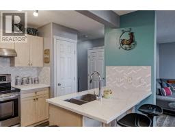 Bedroom - 7 102 Canoe Square Sw, Airdrie, AB T4B2Z1 Photo 5