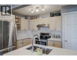 Kitchen - 7 102 Canoe Square Sw, Airdrie, AB T4B2Z1 Photo 2