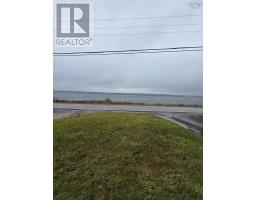 Living room - 2345 Highway 239 Highway, Point Edward, NS B2A4R3 Photo 3