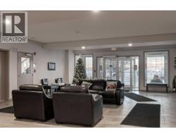 Dining room - 411 1 Crystal Green Lane, Okotoks, AB T1S0C5 Photo 3