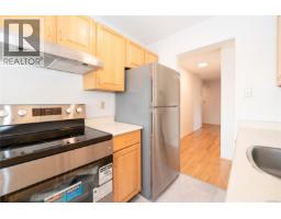 Bedroom - 218 1680 Poplar Ave, Saanich, BC V8P4K7 Photo 4