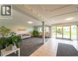 Bedroom - 218 1680 Poplar Ave, Saanich, BC V8P4K7 Photo 3