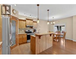 Dining room - 1163 Prairie Springs Hill Sw, Airdrie, AB T4B0G1 Photo 3