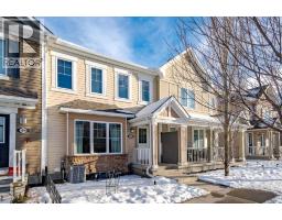 Living room - 3098 Windsong Boulevard Sw, Airdrie, AB T4B3R7 Photo 2