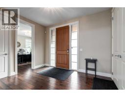 Living room - 2 Watermark Avenue, Rural Rocky View County, AB T3L0C9 Photo 4