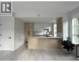 210 2045 Heritage Park Lane, North Vancouver, BC V7H0E3 Photo 3