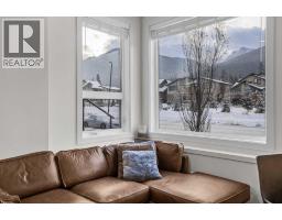 Living room - 102 E 1200 Three Sisters Parkway, Canmore, AB T1W0M5 Photo 5