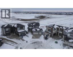 Den - 214 Waterstone Bay, Chestermere, AB T1X2Z1 Photo 2