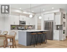 Dining room - 91 Waterford Mews, Chestermere, AB T1X3B7 Photo 2