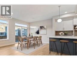 Kitchen - 91 Waterford Mews, Chestermere, AB T1X3B7 Photo 3